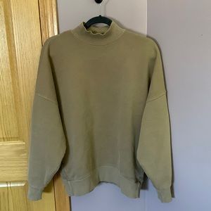 Tna mock neck sweatshirt from Aritzia. Khaki color, with pockets